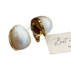 Baroque pearl earrings with golden metal casing and white vintage french style aesthetic