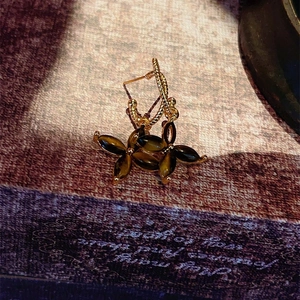 Tiger eye stone four-petal flower earrings with gold twisted rope texture detail