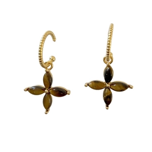 Tiger eye flower earrings with gold-plated ribbed C-shaped hooks on a white background