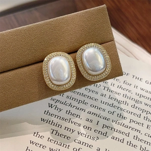 Vintage oval pearl stud earrings with gold plating and micro-inlaid zircon accents