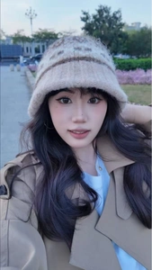 Close-up of thick Fair Isle knit bucket hat with fuzzy texture for winter warmth
