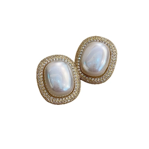 Vintage oval pearl stud earrings with gold plating and cubic zirconia halo setting