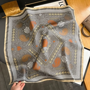 Elegant mulberry silk square scarf with paisley and elephant prints in taupe and champagne