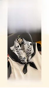 Close-up of 70x70cm zebra print mulberry silk scarf with premium texture and drape