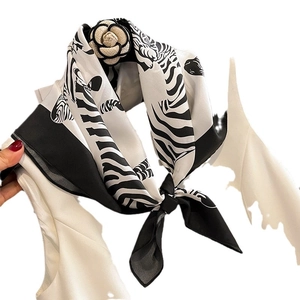 Elegant zebra pattern silk scarf for women featuring a stylish camellia flower brooch