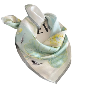 Premium silk scarf with lotus and koi print in elegant 3D folded display style