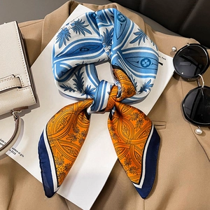 Elegant 70cm square silk scarf with blue and orange palm leaf print and geometric patterns