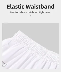 Detailed macro shot of the elastic waistband on white quick-dry athletic shorts