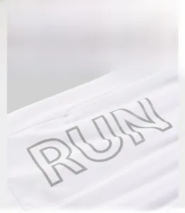 Detail of reflective RUN logo on white quick-dry breathable fabric for night running