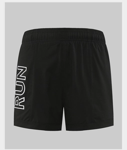 Close-up of RUN lettering and quick-dry fabric texture on women's black sports shorts