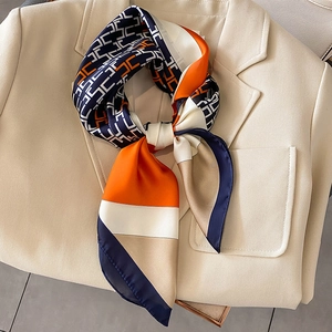 Elegant geometric print silk scarf with orange and navy color block for women fashion