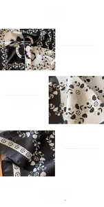 Détail macro du foulard en soie camélia avec impression numérique et double bordure