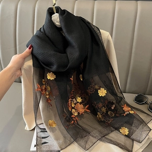 Fashion silk blend long scarf with floral embroidery and mesh splicing on a beige knit