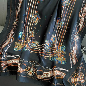Elegant black silk scarf with retro orange and blue floral chain patterns for women