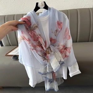 Lightweight light blue chiffon scarf with pink floral prints and elegant script calligraphy