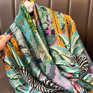 Elegant vintage floral silk scarf featuring vibrant tropical leaves and zebra patterns