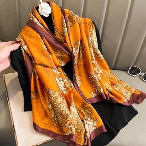 Elegant floral silk scarf in orange gold with vintage chrysanthemum and ruyi pattern