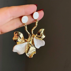 Elegant oversized iris flower drop earrings in gold and white enamel for women