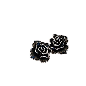 S925 silver needle black enamel camellia earrings with sparkling rhinestone accents