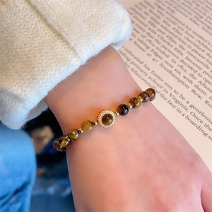 Bracelet en pierres d'oeil de tigre vintage avec pendentif doré en zircon sur tricot