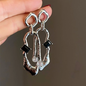 Abstract geometric 925 silver needle drop earrings with emerald and ruby stone insets
