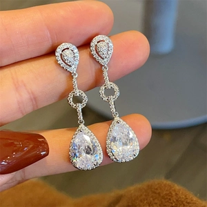 Elegant silver pear-shaped drop earrings with micro-pave cubic zirconia crystals