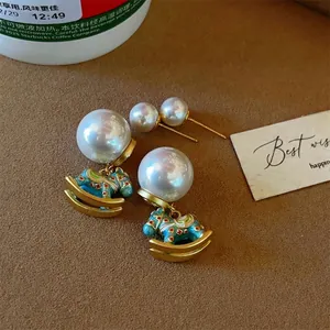 Luxury rocking horse pearl earrings and stud set with colorful blue enamel finish