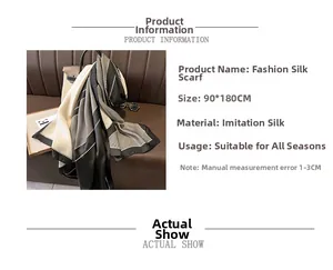 Detail of silk-like scarf with black and beige block patterns and pearl polka dots