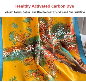 Close-up of printed silk scarf showing vibrant floral patterns and active carbon dyeing