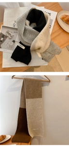 Nahaufnahme der farblich abgesetzten Strickschal mit Scarf Collection Stoffetikett