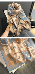 Detail of horse print cashmere shawl with tassels and vintage artistic pattern
