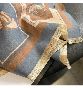 Detail of vintage horse carriage scarf showing twill texture and delicate fringe trim