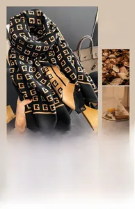 Detail of warm winter scarf showing double-sided letter pattern and soft tassel edges