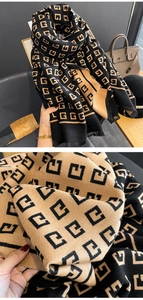 Close-up of double-sided knit scarf with geometric patterns and fringe detail