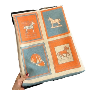 Retro equestrian cashmere-like shawl with horse patterns in orange and blue color blocks