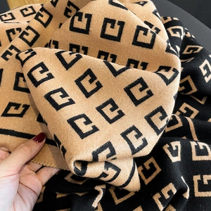 Double-sided knit shawl with camel and black letter pattern and jacquard texture