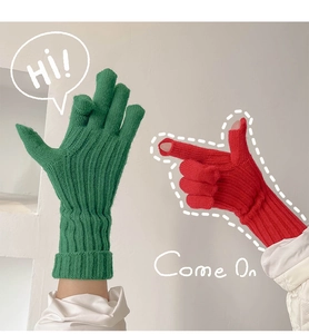 Detail of finger opening design on thick ribbed knit gloves for touchscreen usage