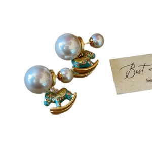 Luxury enamel rocking horse earrings with grey pearls and vintage gold finish