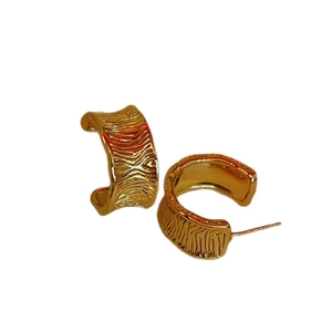 Textured gold-plated wide hoop earrings for women with a minimalist C-shape design