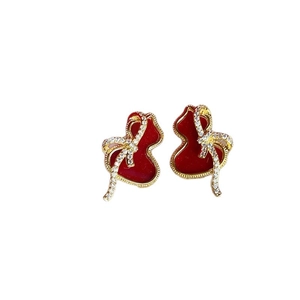 Elegant red gourd stud earrings with gold crystal bow detail on white background