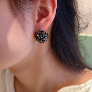 Elegant vintage hollow ball stud earrings featuring black marquise stones and silver finish