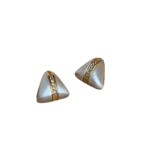 Minimalist geometric triangle stud earrings with brushed silver finish and gold zircon inlay