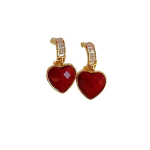 Elegant gold earrings with red zircon heart drop and clear rectangular gemstone accents