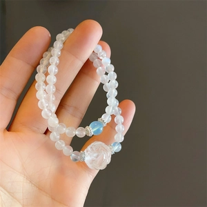 Double-strand white moonstone beaded bracelet with carved rose flower and charms