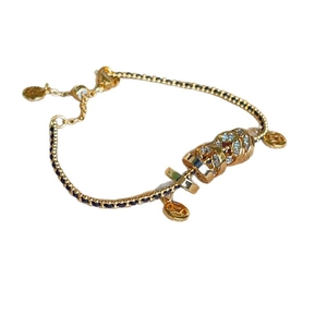 Modern gold coin charm bracelet with black woven rope and sparkling crystal beads
