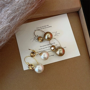 Elegant two-way cotton pearl earrings with champagne rhinestones and vintage gold hooks
