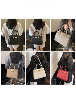 Multiple views of a vintage pebble leather handbag with metal turn-lock and shoulder strap