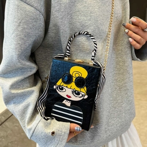Retro box evening bag featuring cartoon female portrait with gold chain strap