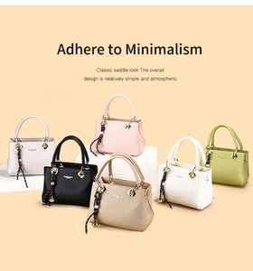 Litchi texture leather handbags in six colors with gold hardware and woven pendant charms