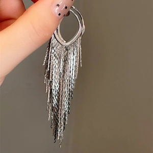 Silver tassel earrings with metallic mesh fringes and irregular oval hoops for women